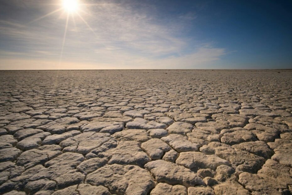 the sun is shining over a vast expanse of land